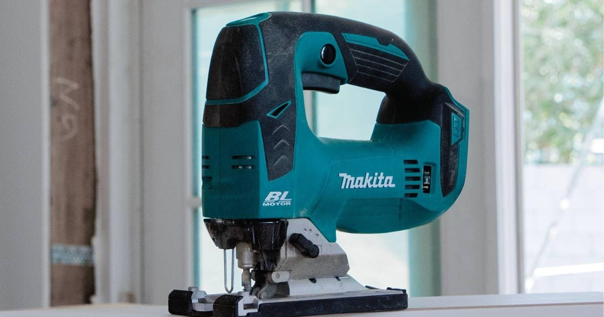 A Makita 18V LXT XVJ02 top-handle cordless jigsaw showing the BL brushless motor badge, the shoe and the blade clamp