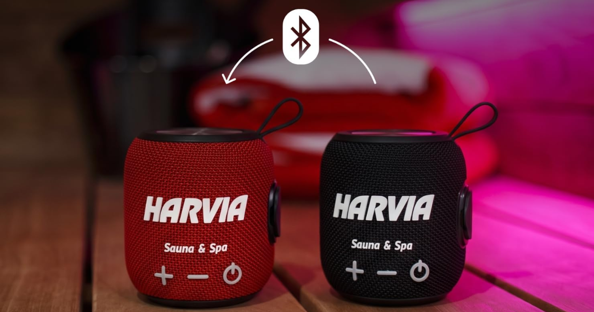 Two Bluetooth sauna speakers, one red and one black, shown side by side with a Bluetooth pairing icon