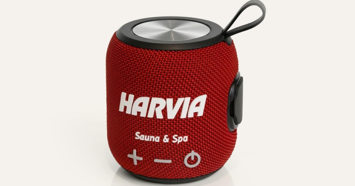 Red fabric-wrapped portable Bluetooth speaker for sauna use, product photo on white background